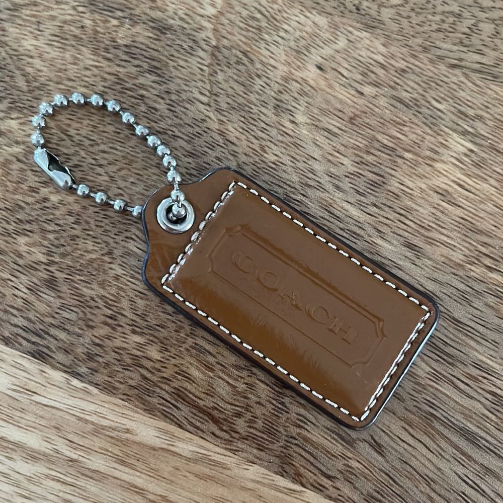 Coach brown leather large Hang Tag